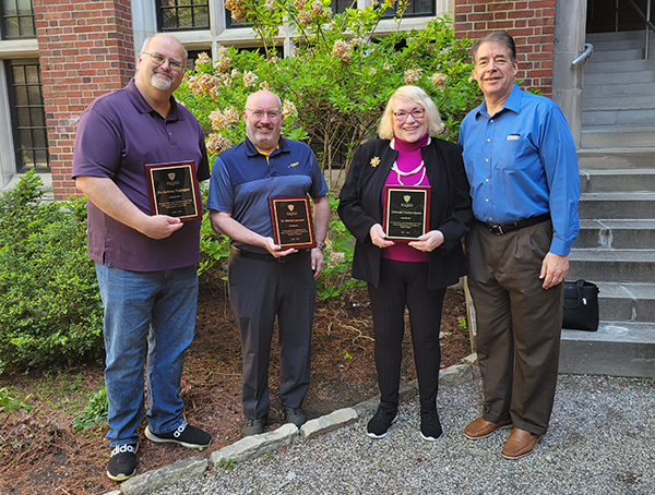 Three Senate committee chairs were recognized for their extraordinary leadership and service to The University of Toledo. From left to right: (first) Dr. Anthony Edgington, Chair of the Faculty Senate Committee on Undergraduate Curriculum, (second) Dr. Patrick Lawrence, Chair of the Faculty Senate Committee on Academic Programs, (third) Dr. Deborah Coulter-Harris, Chair of the Faculty Senate Committee on Student Affairs, and last (fourth) Dr. Gary Insch, Faculty Senate Past-President.
