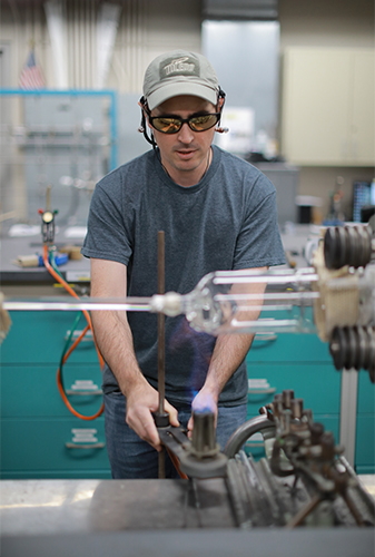 Eamon King works in his small workshop tucked near the back of Bowman-Oddy Laboratories.