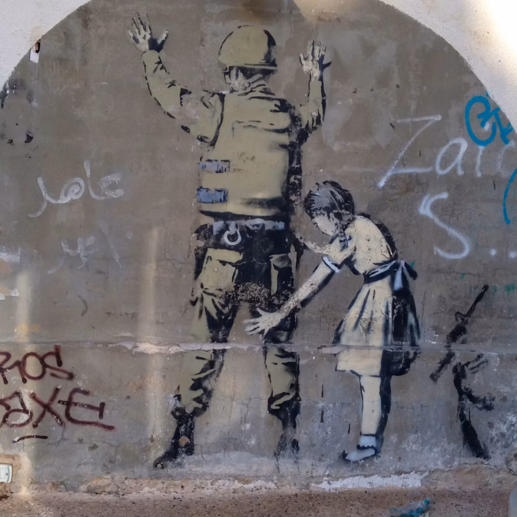 Il murales simbolo della resistenza in Cisgiordania- l'occupazione e il rapporto tra forze militari e popolazione civile raccontati attraverso la street art